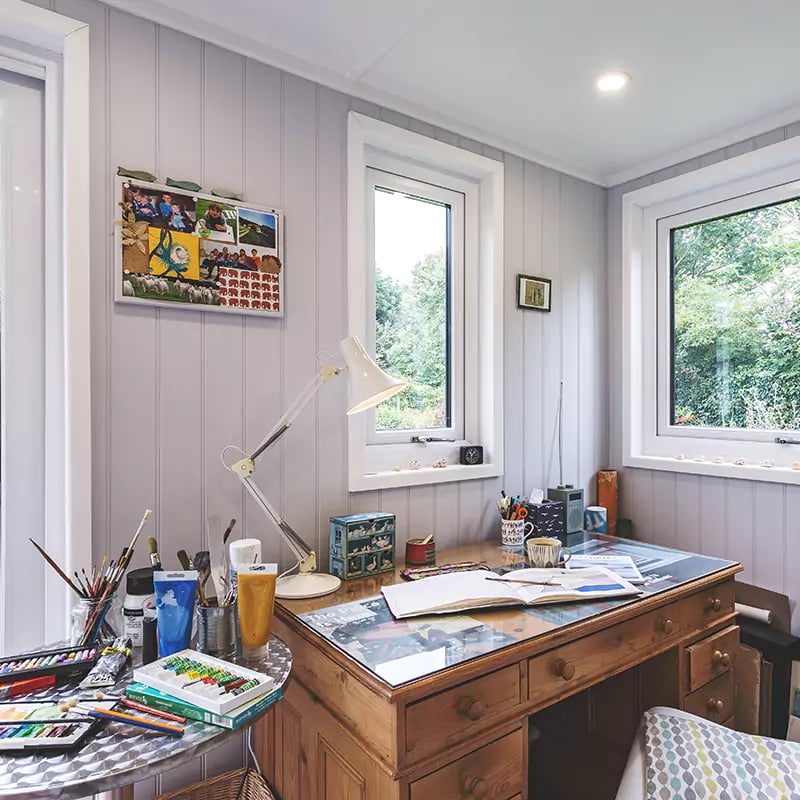 Interior of a garden room for art with easel