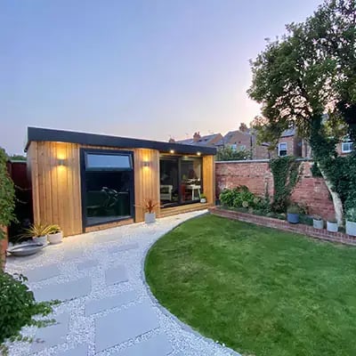 luxury garden office at dusk