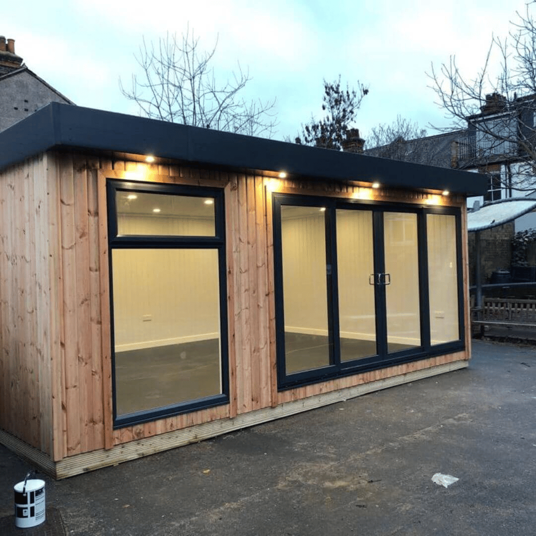 Sudbourne Primary extra classroom cabins for schools building with playground area and spotlights and overhang