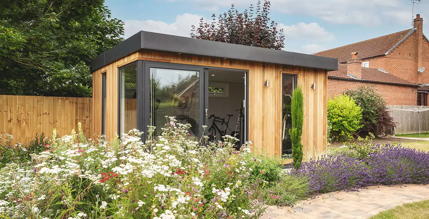 Garden room gym in beautiful english garden setting