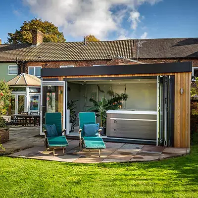 Hot tub garden Building with open Bi-Fold Doors 