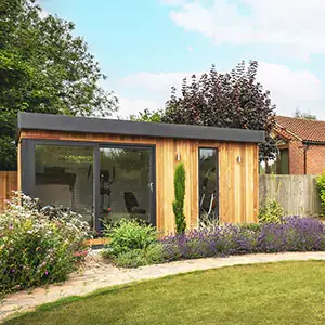 Custom designed gym in garden with lavender bushes and other plants framing shot