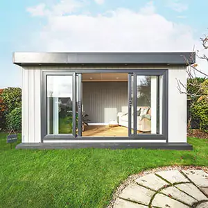 Zero maintenance garden office with black sliding doors